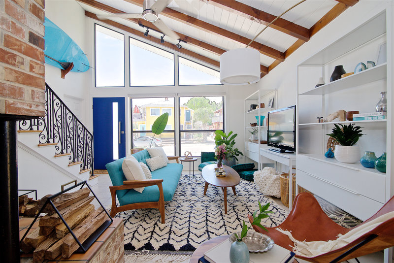 Midcentury modern and bohemian influenced living room by Denver based interior designer Fernway & Avalon