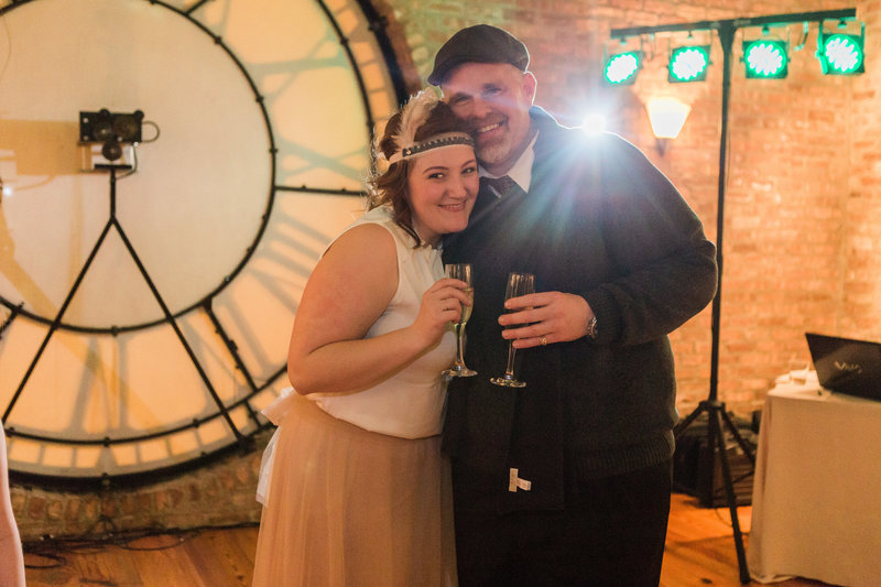 Hadassah and husband, Corey, share a New Years toast at Studio Manarchy in Chicago