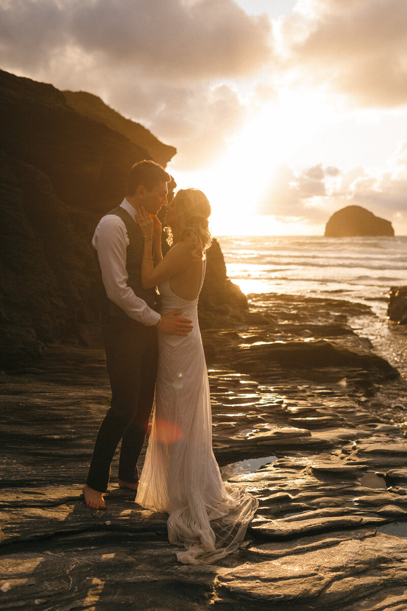 Wedding photos at the beach at sunset in Cornwall
