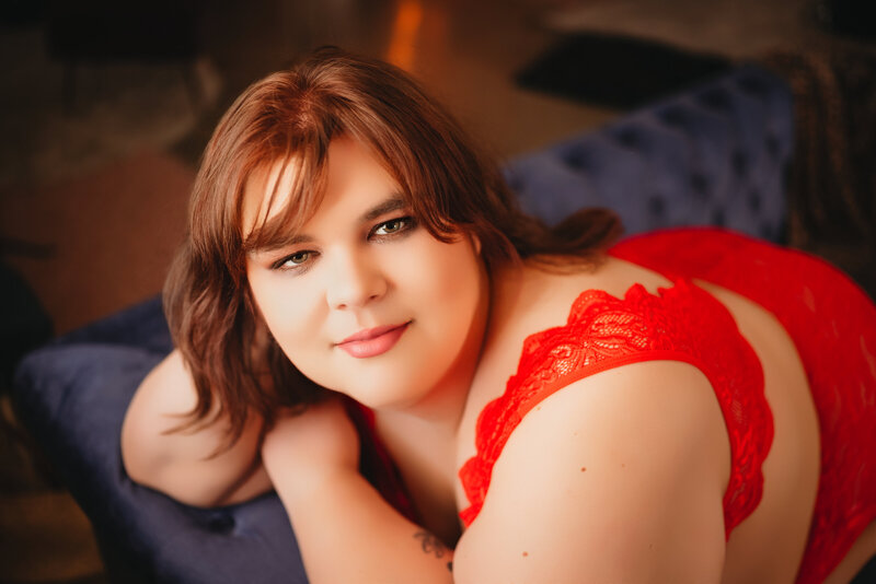 woman in red lingerie looking at camera