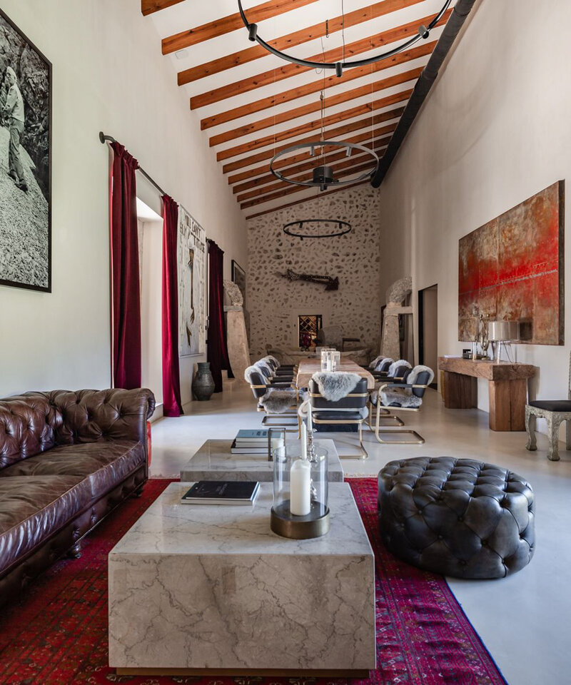 Elegant villa with high timber ceilings and curated design, offering an exclusive retreat experience.