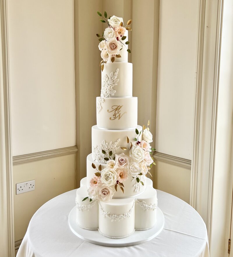 Luxury wedding cake with floral skirt at Bawtry Hall, Doncaster