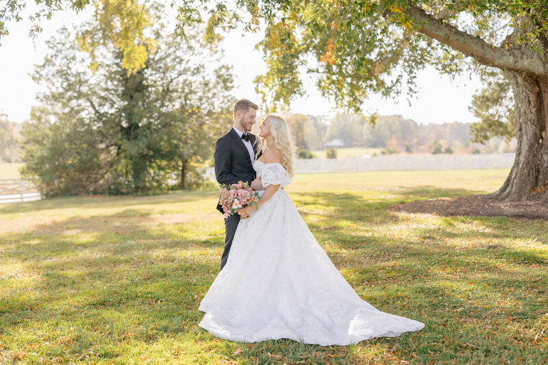 Richmond Wedding Photographer, a couple looking at each other under a tree