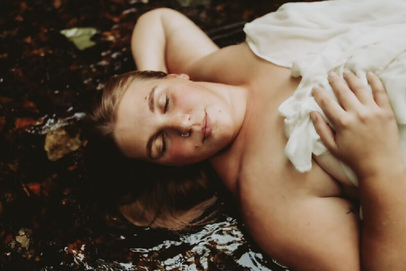 woman laying in water