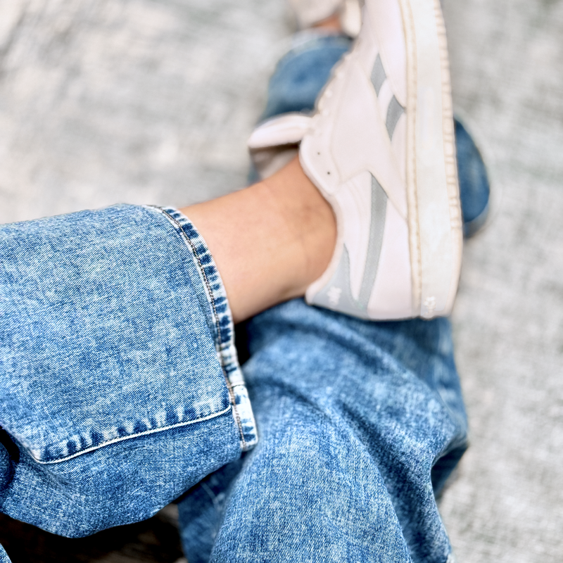 Jeans shortened while keeping original hem