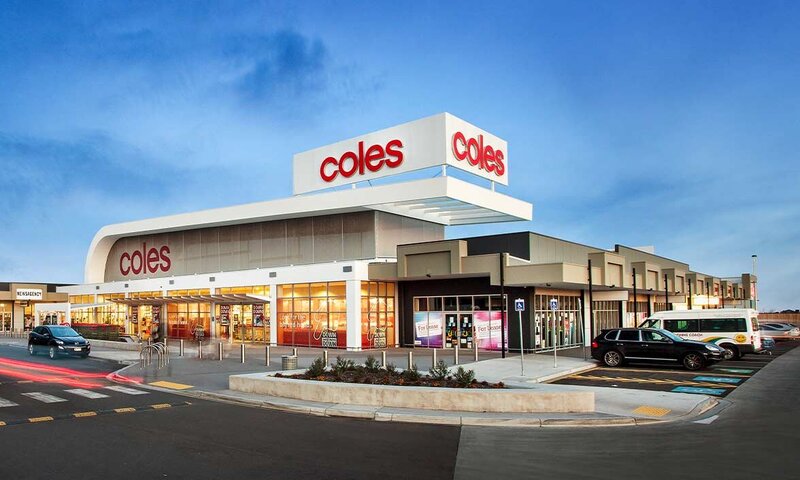 New Coles-anchored Chipping Norton Shopping Centre constructed by Serlana, featuring modern facade and undercroft car park.