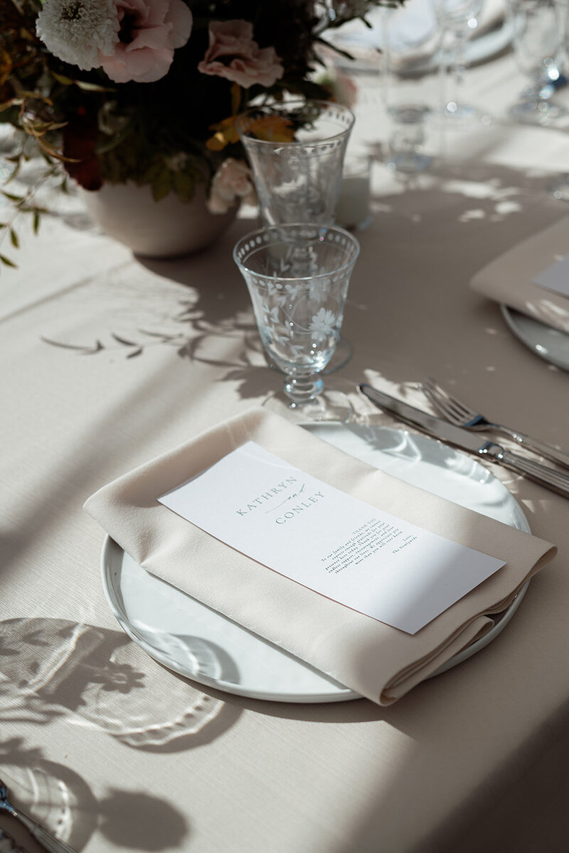 A set table at a wedding reception, representing Boise wedding and event planning done by Perfect Thirds Co. 