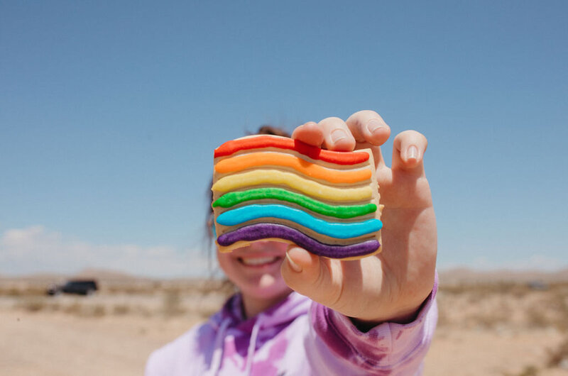 Close up of a pride flag cookie.