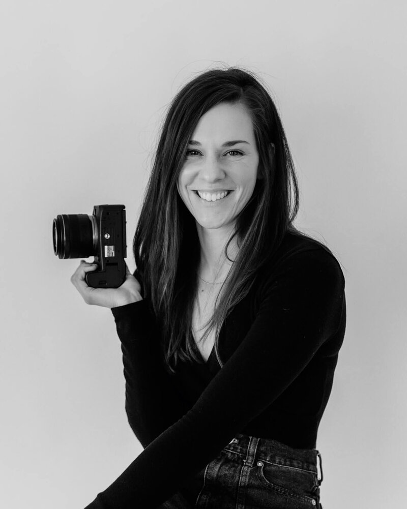 A professional portrait of Mackenzie Romagni, a Cleveland newborn photographer specializing in lifestyle family and newborn photography.