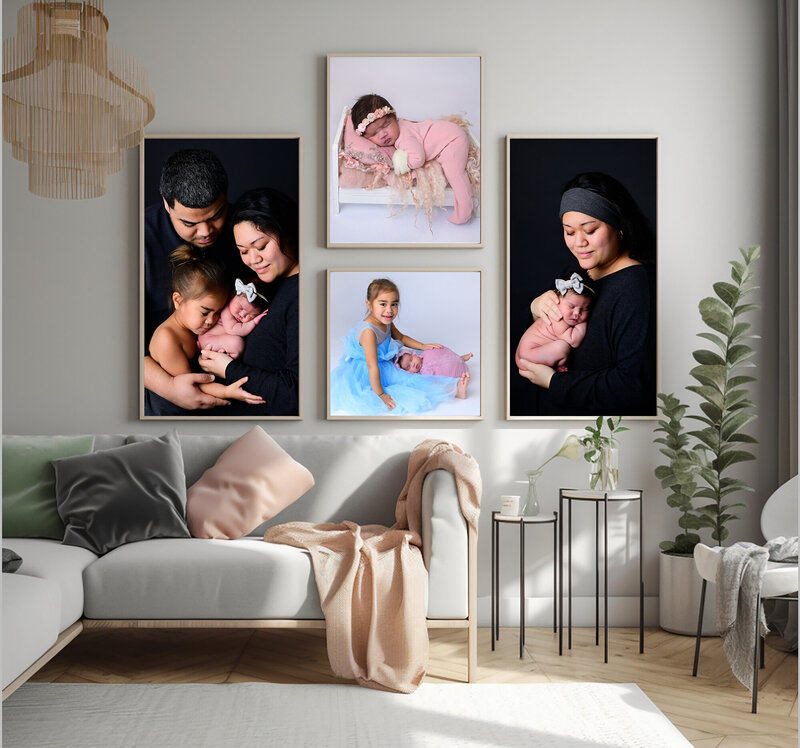 Mock up of family portraits on a wall in a living room.