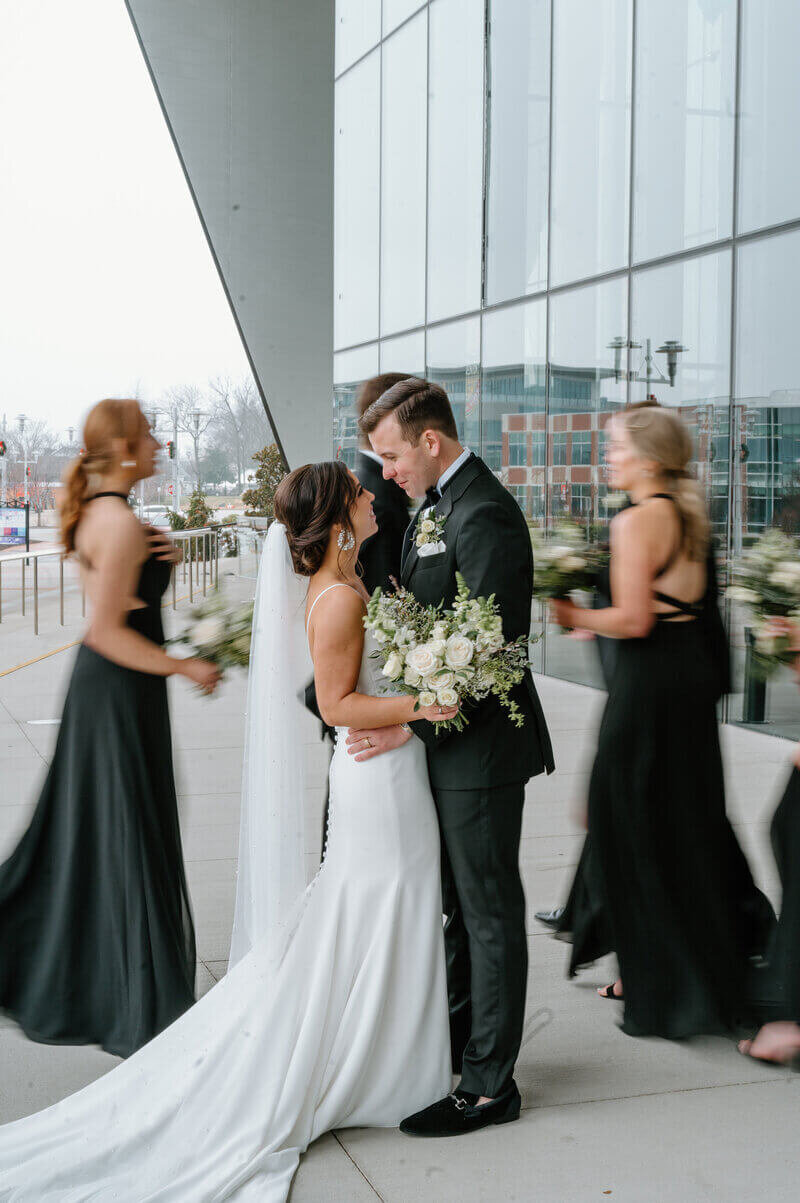 Couple surrounded by wedding party taken by lexington wedding photographer