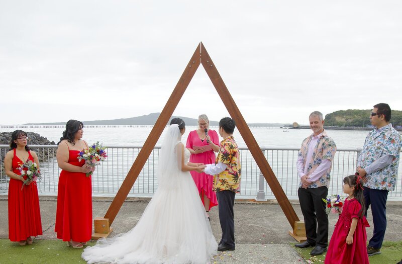 Professional NZ marriage celebrant delivering romantic, playful ceremony for newlyweds