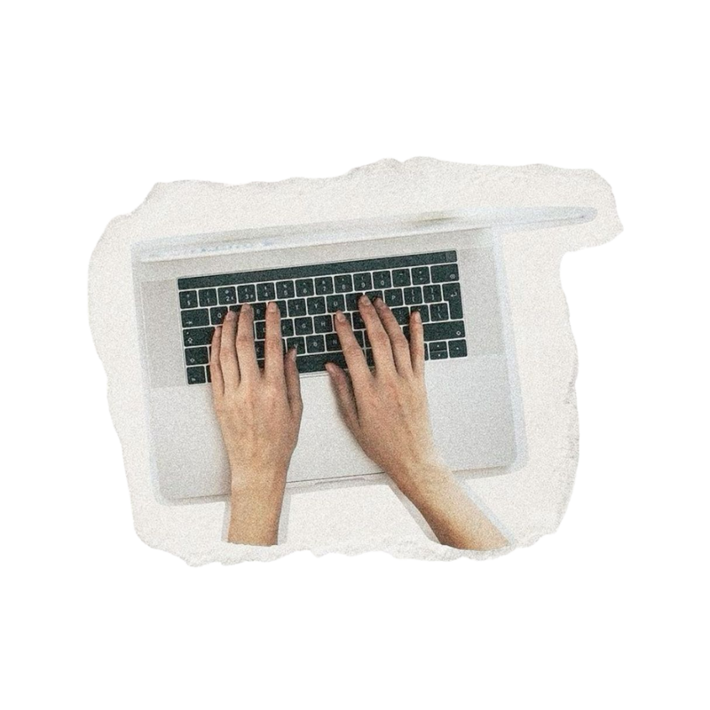 hands typing on a laptop