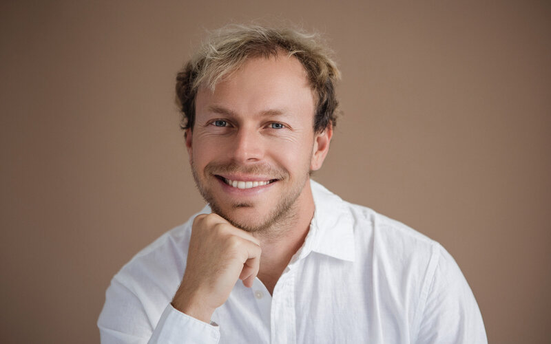 Elevate your corporate image with a professional headshot session for your team by Ingrid Photography. Stand out together!