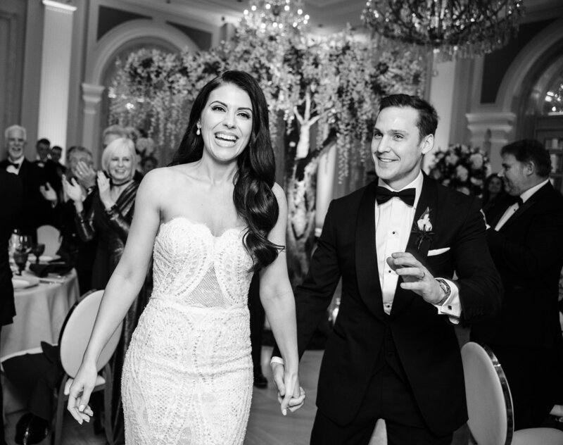 wedding photo of a bride and groom just married walking down the aisle in cheshire