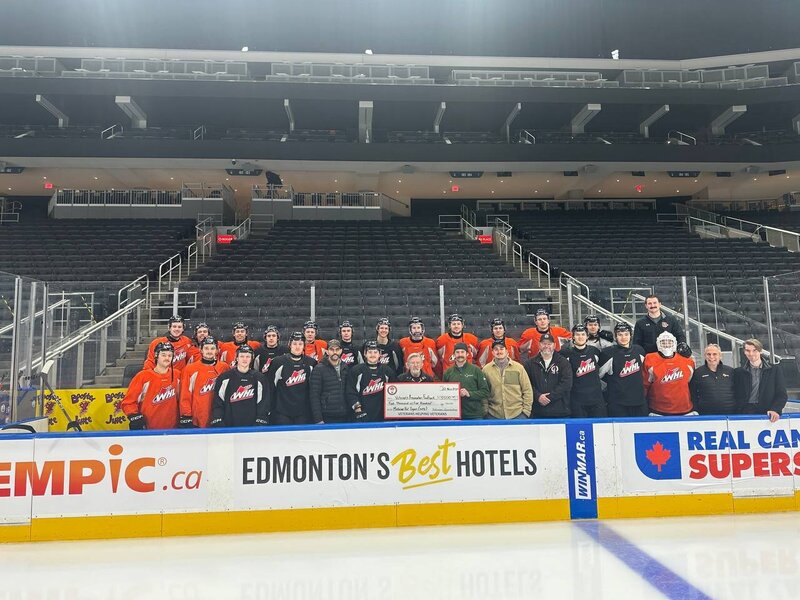Group of youth athletes on an ice rink supported by All Around Performance mentorship program