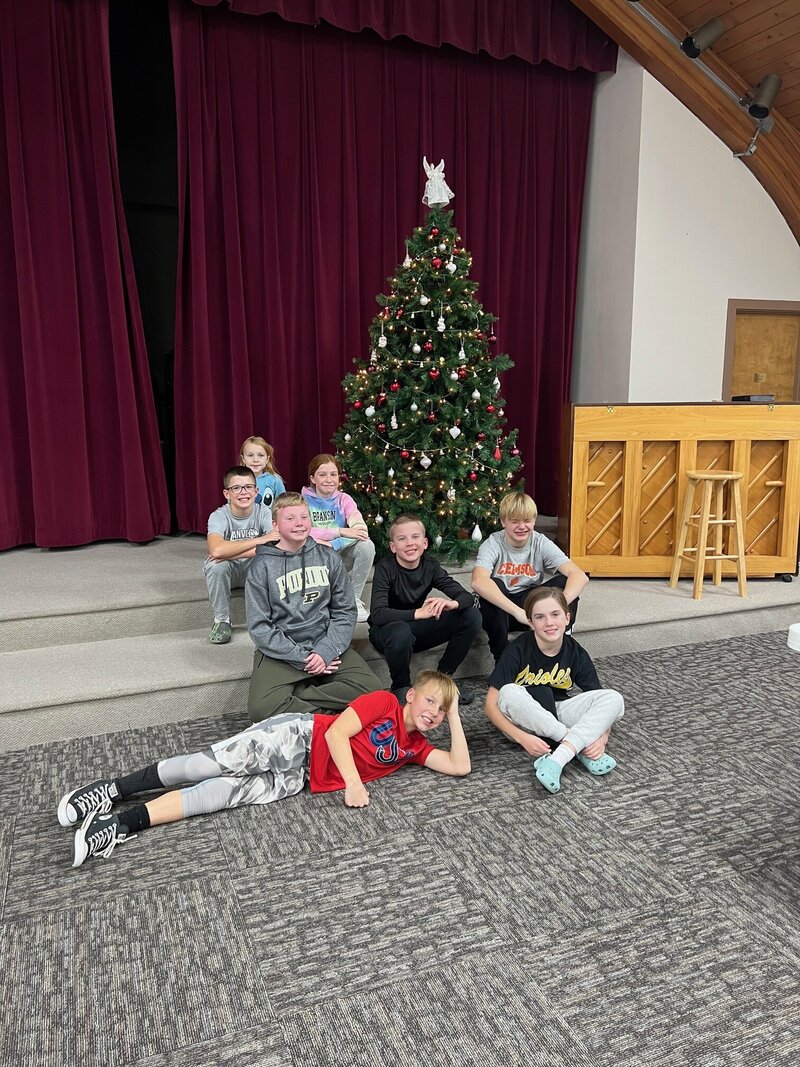 Bartlett Chapel's C.R.E.W., or Christians Ready, Equipped, and Willing,  pose for a photo at Christmastime.