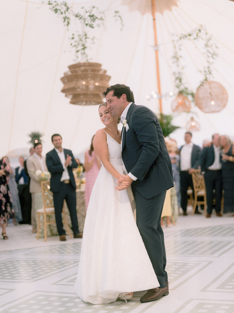 A newly married couple exit a church in Boston