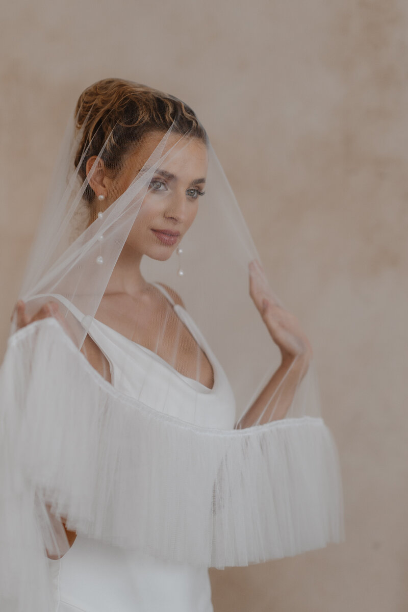 Editorial Wedding Photography Bride under veil in Lake Garda