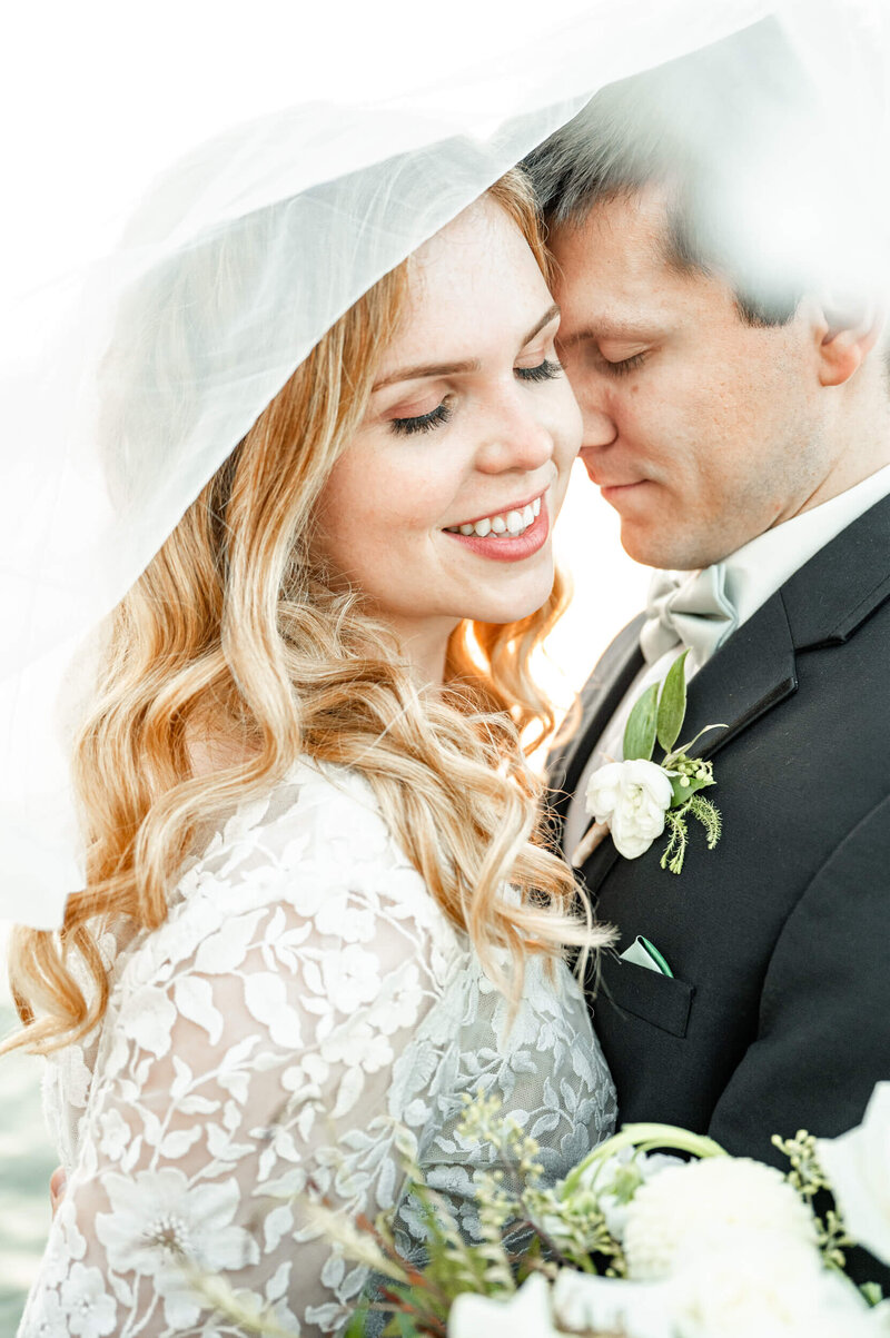A Bride and Groom enjoying their wedding day by Madison, WI wedding photographers Morgan Madeleine Photography