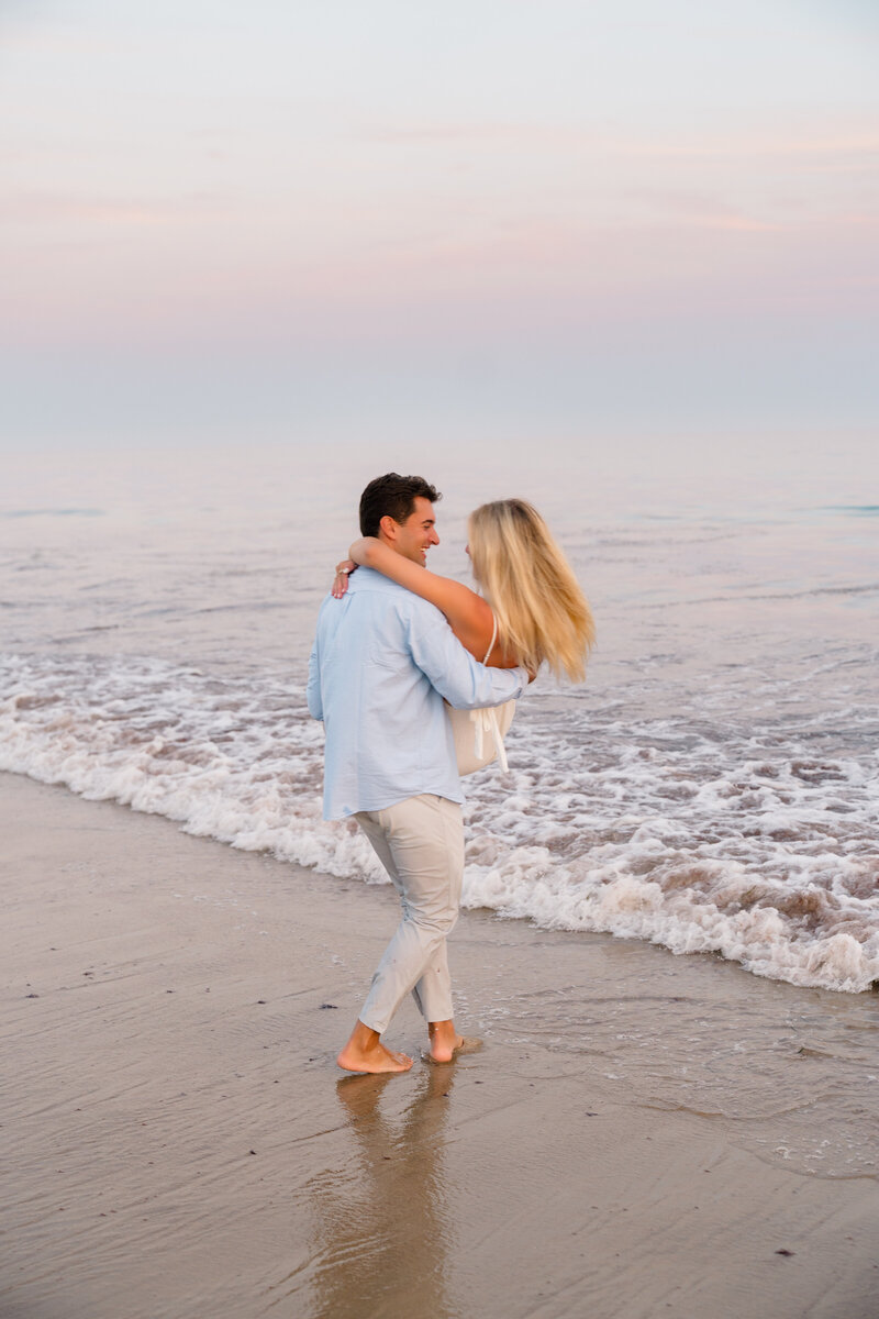Wedding Photographer Newport RI | Rhode Island Caprio Captured Photography | Maternity Session With A Couple Embracing At The Beach