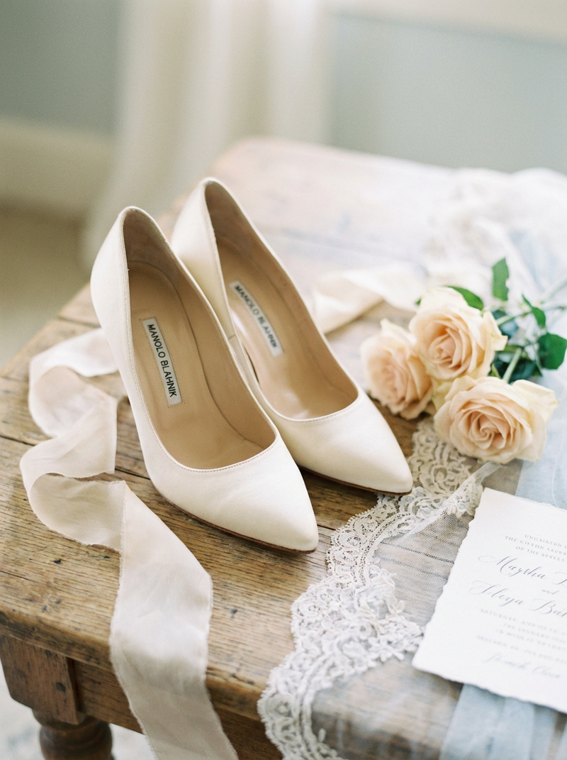 Firefly_Gemini Flash_Fine-art bridal detail shot on soft film stock. Manolo Blahnik heels styled elegantly 630868