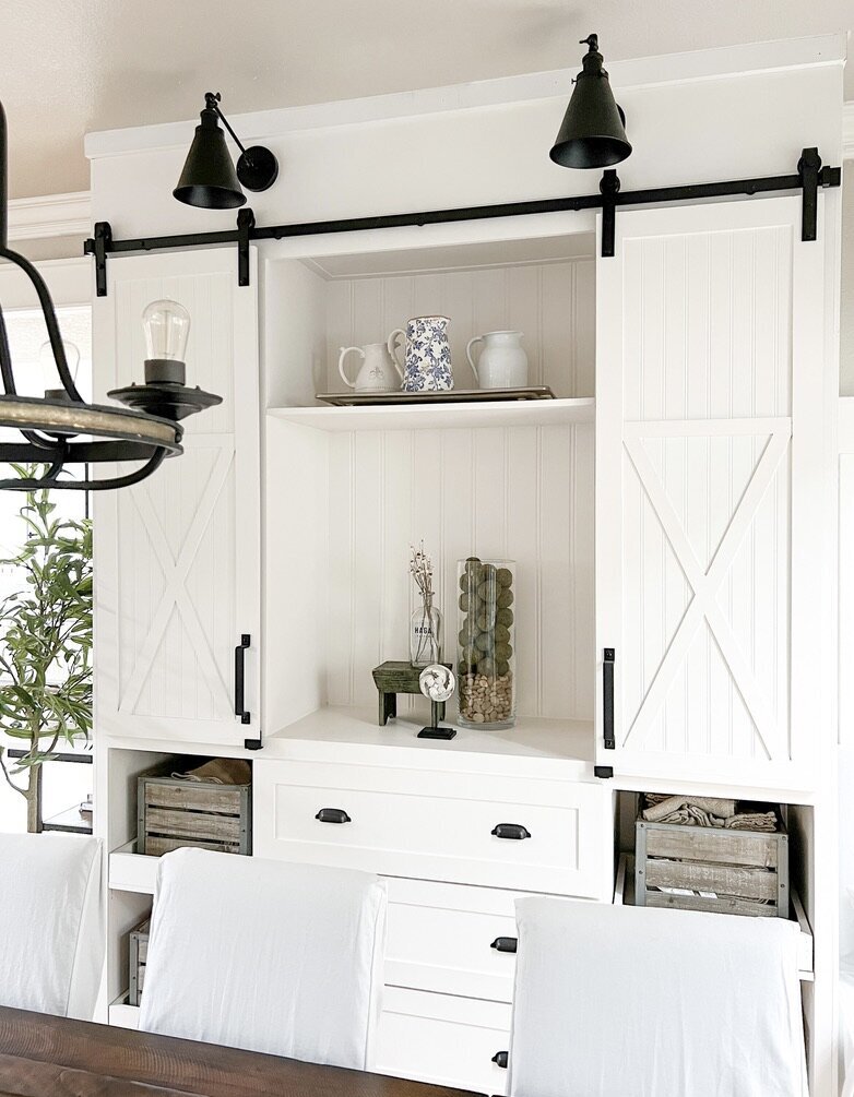 dining room with built in and table and sherwin williams accessible beige paint and sherwin williams pure white