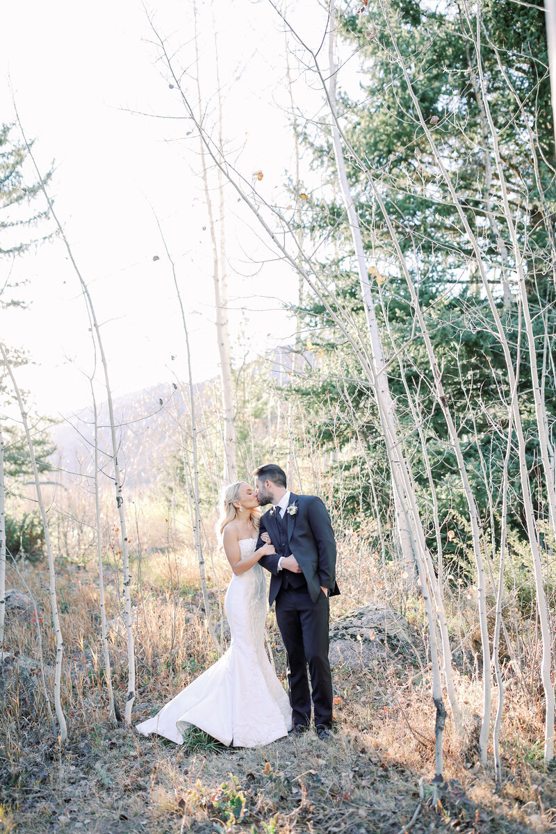 Portrait of a bride and groom after their Vail Colorado wedding ceremony in the fall.