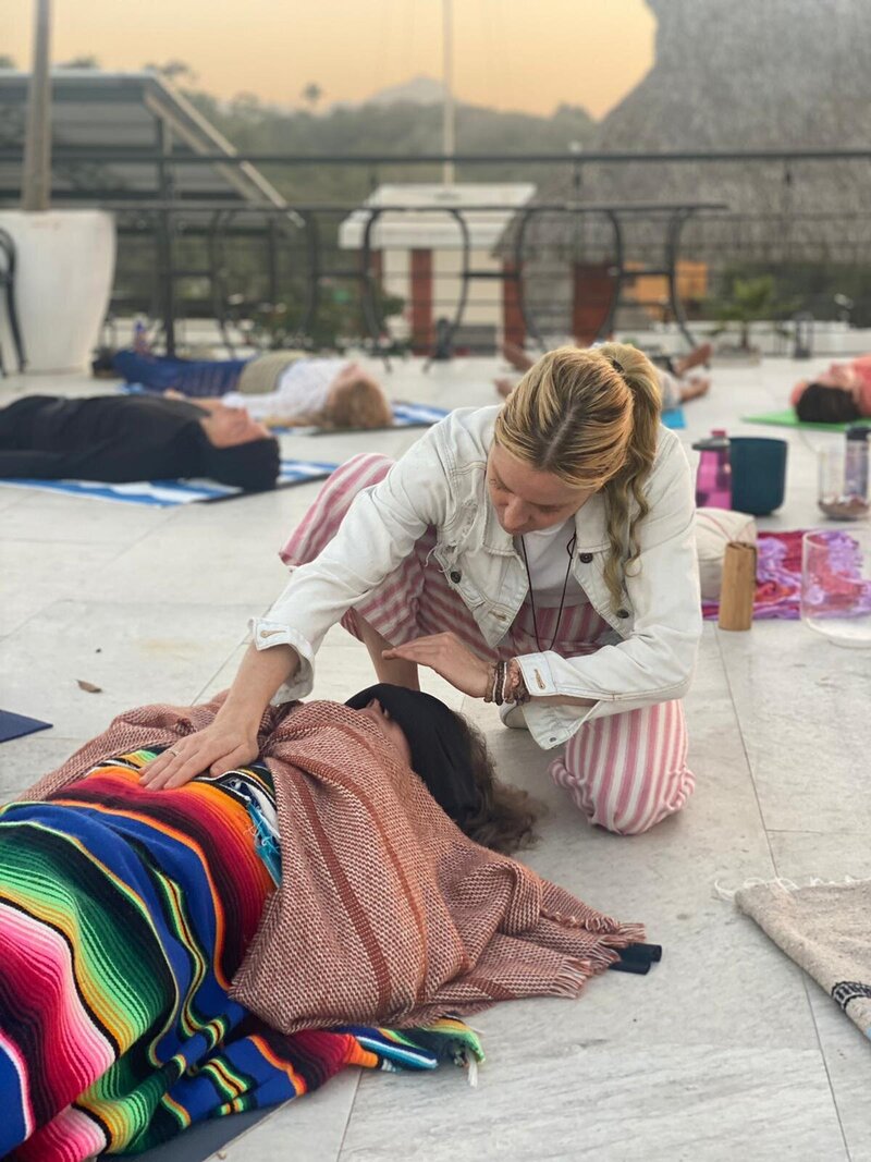 Megan Ashton guiding a breathwork session in Sayulita, making conscious breathing as accessible and transformative as yoga through her expert facilitation.