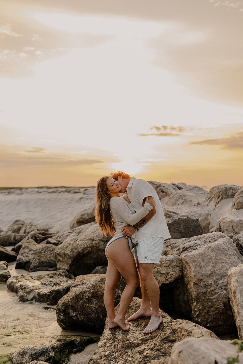 Orange Beach wedding photographer capturing engagement photos at sunrise