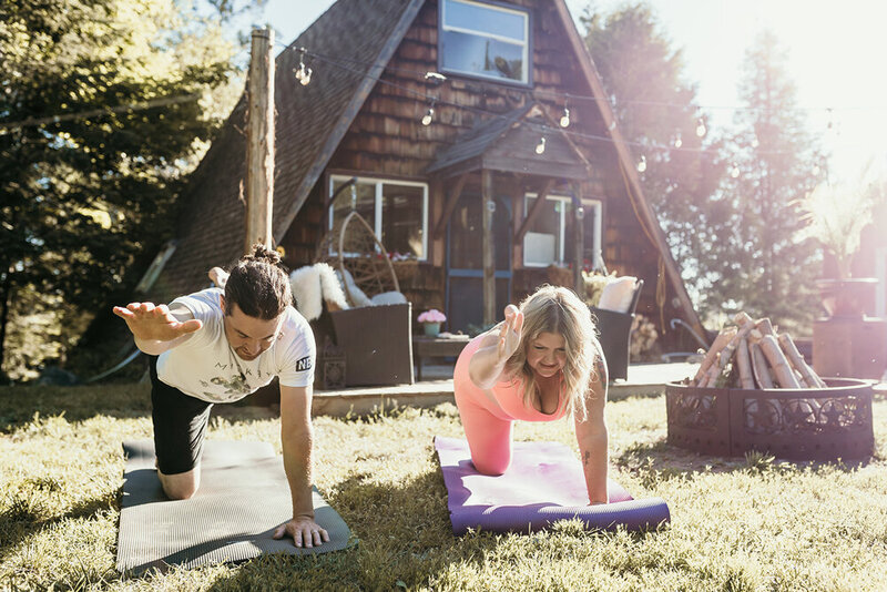 Tasha-and-shane-doing-yoga