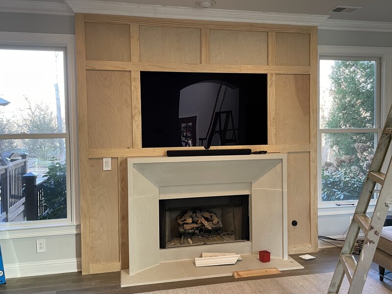 custom fireplace with paneling