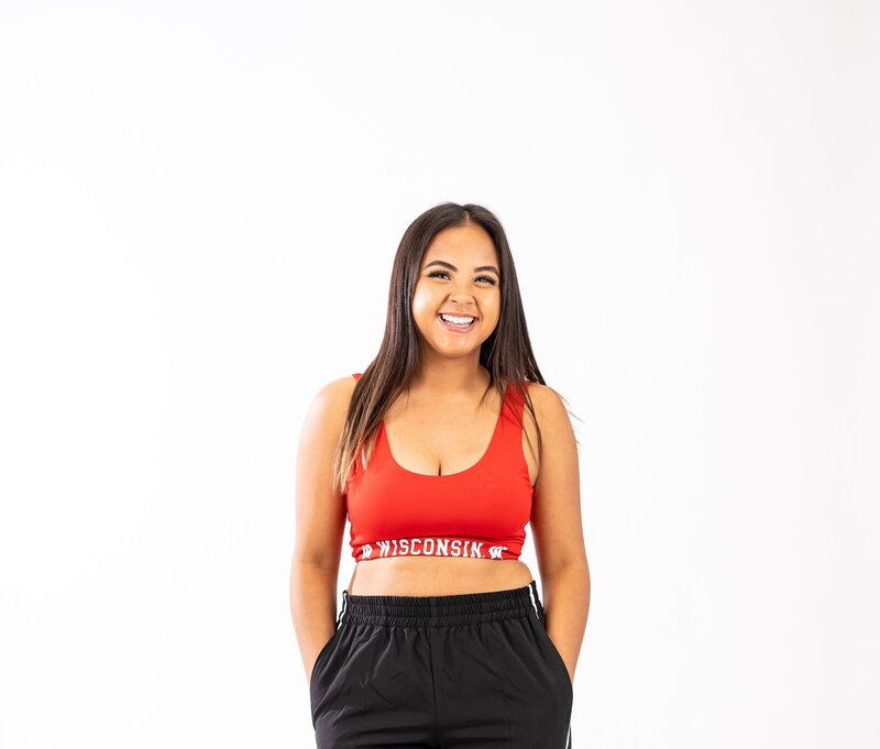 red sports bra with wisconsin on the band