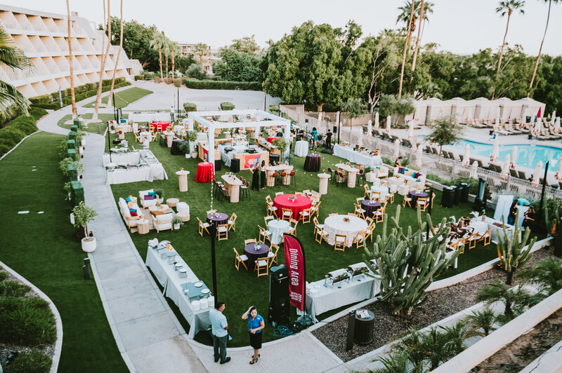 Aerial view of luxury corporate event layout with vendor booths and seating, captured by MISGIF’s professional Phoenix event photographers.