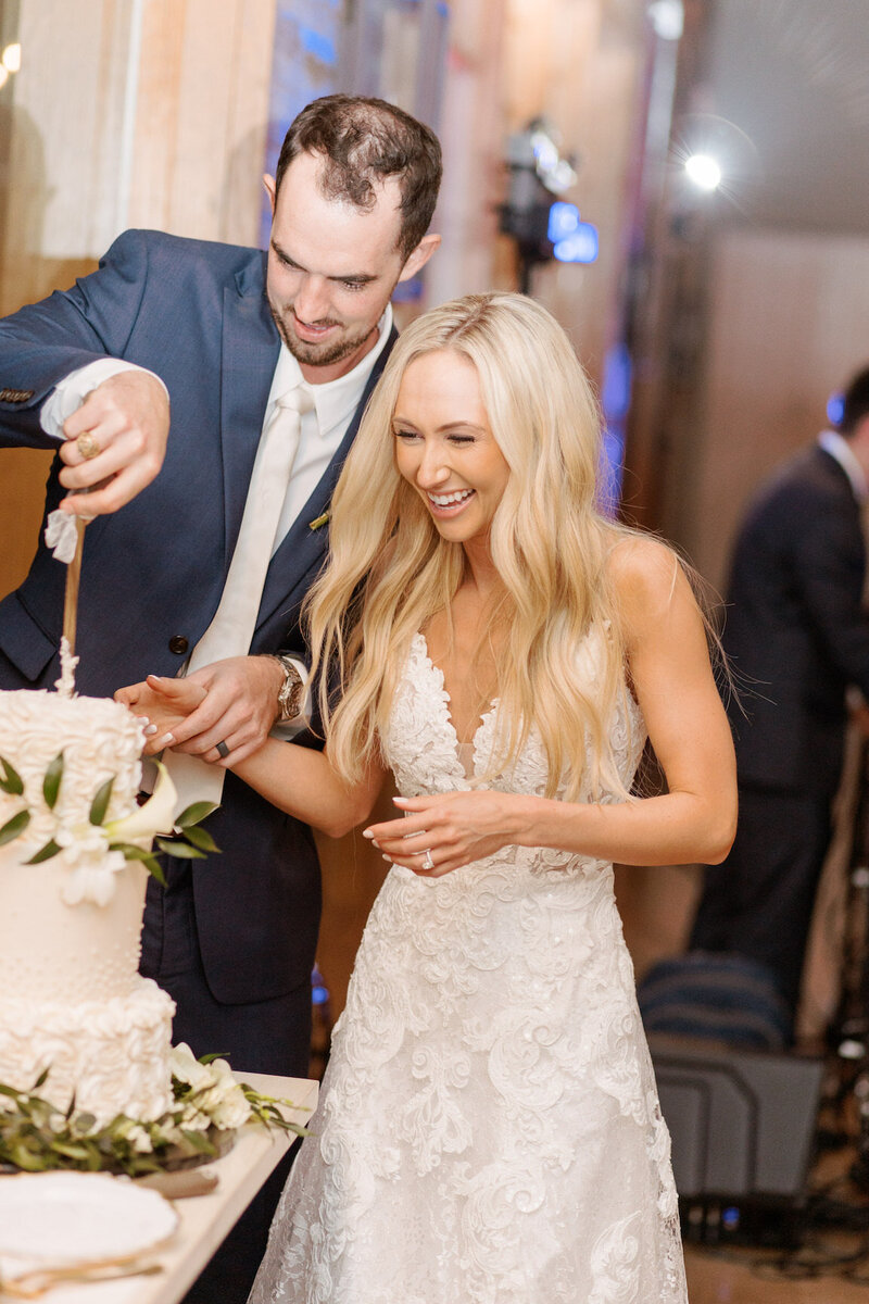 Reception decor in Canyonwood Ridge hall with romantic lighting and Hill Country details