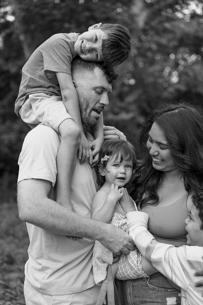 Happy family laughing and hugging
