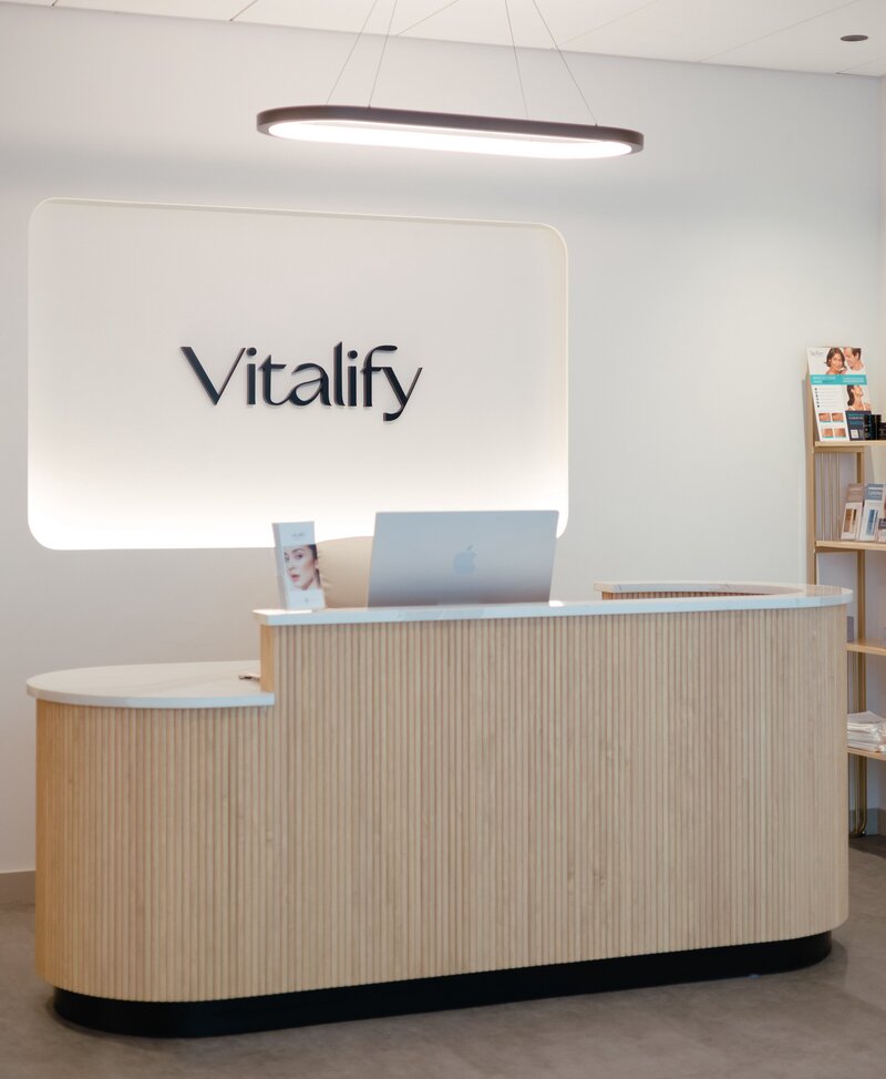 Lobby of functional medicine office with logo