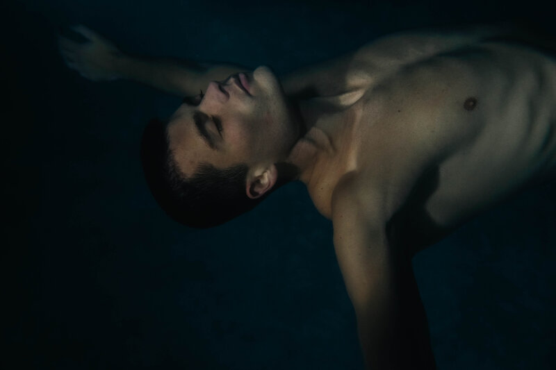 Portrait of man swimming underwater