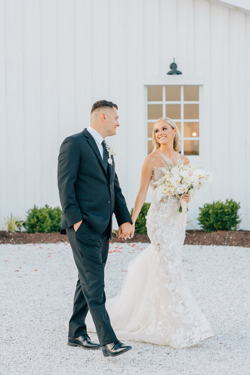 bride and groom walking on wedding day