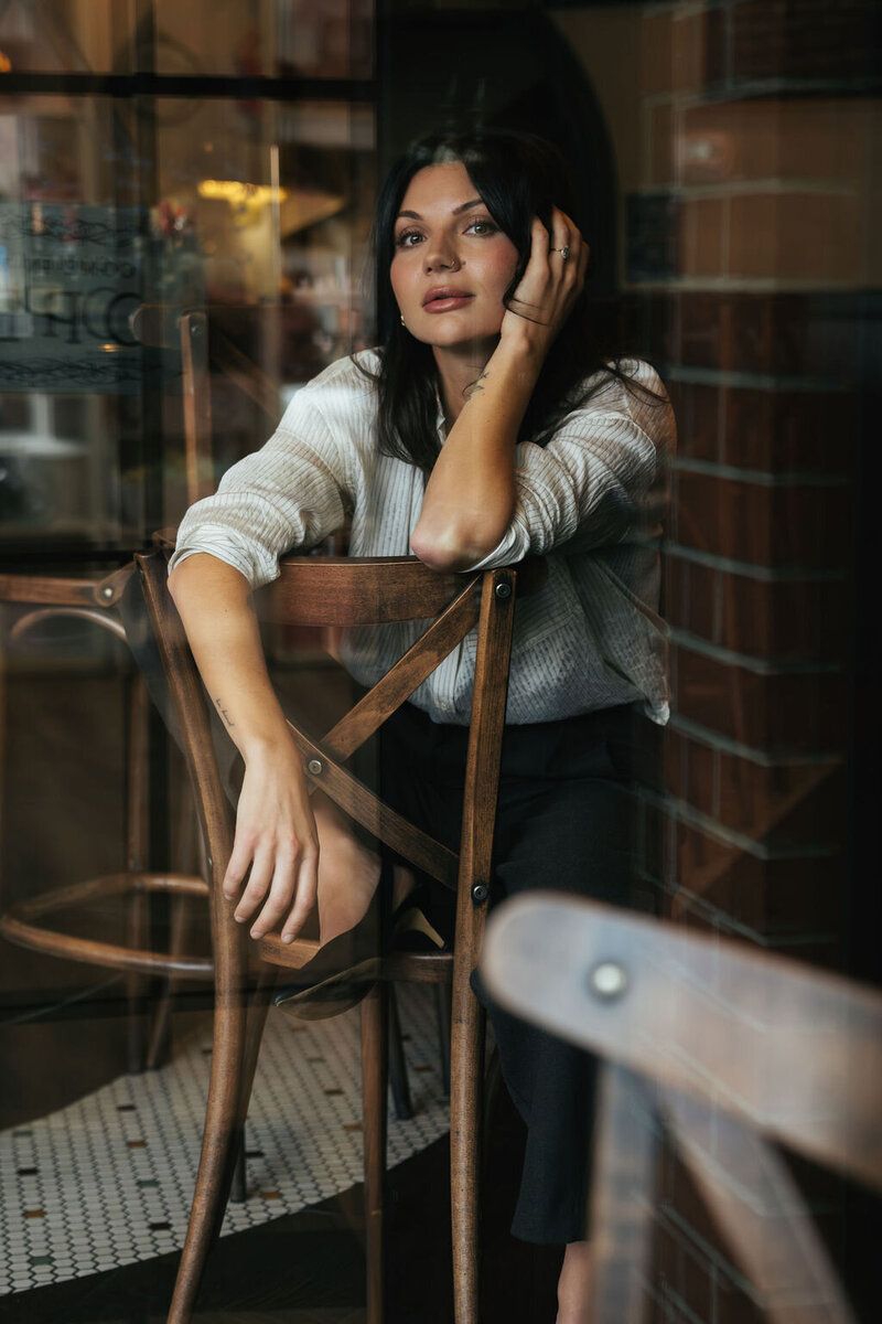 wedding couple running barefoot on the beach in Tofino