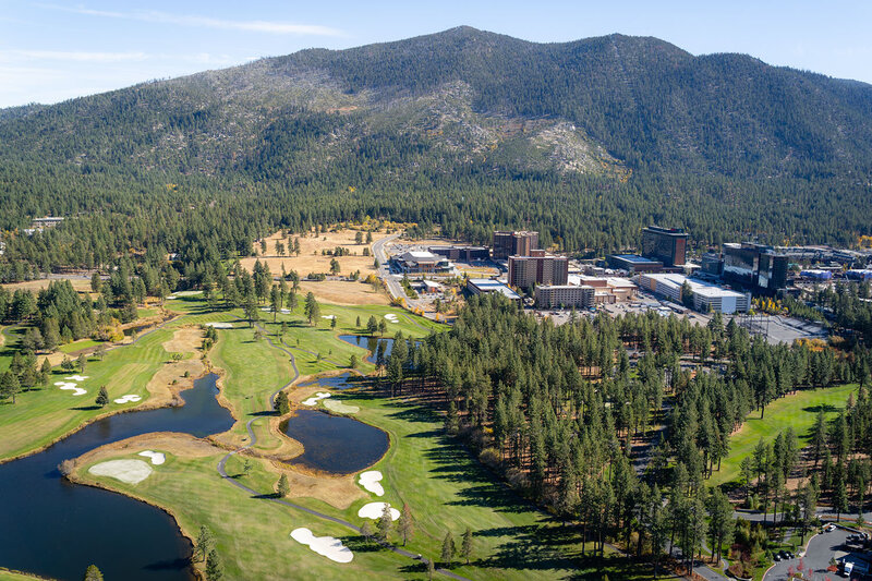 aerial with hills and buildings of reno nevada - helicopter charters for sightseeing