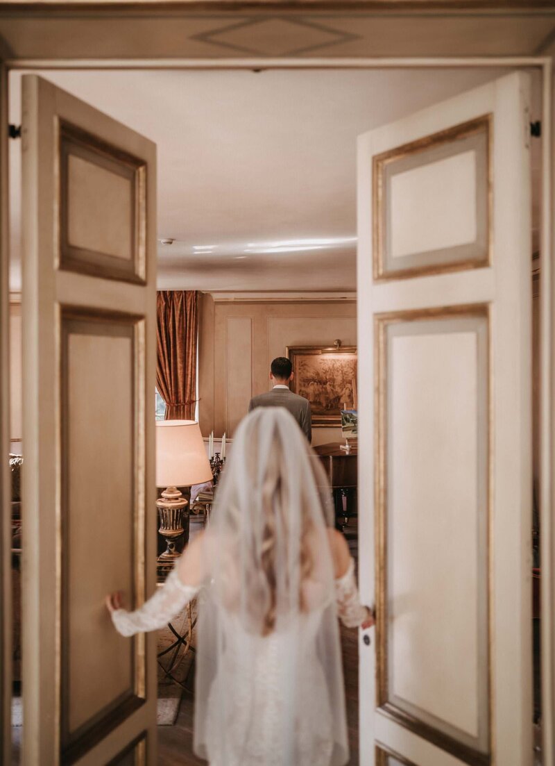 bride and groom first look at borgo santo pietro 