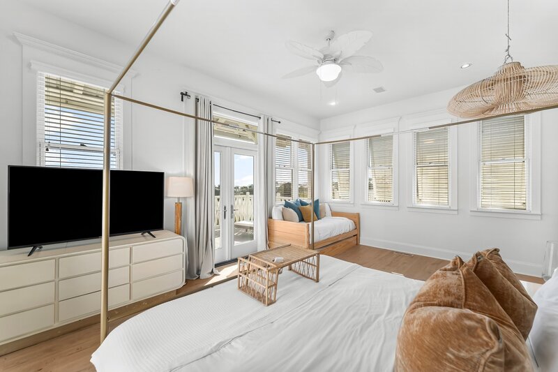 Spacious Primary Bedroom with King Bed and Balcony - Panama City Beach Vacation Rental	
