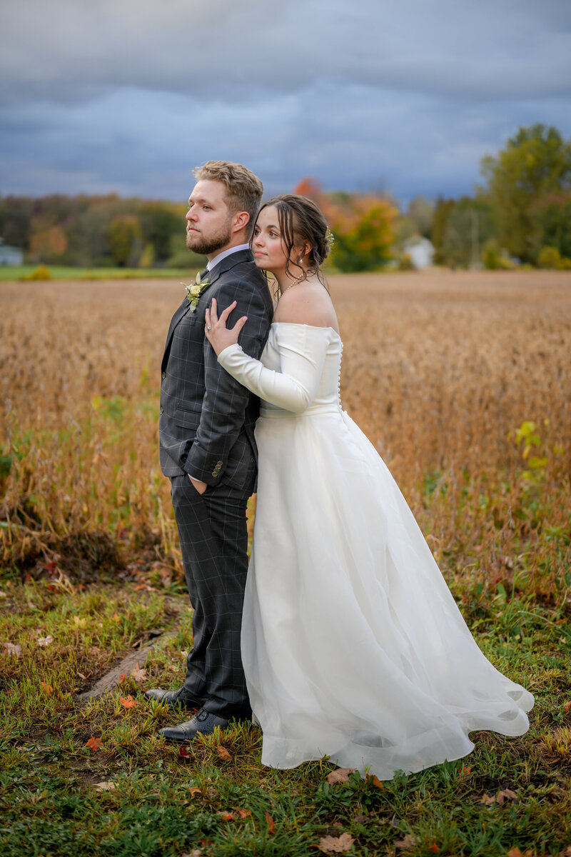 A bride and Groom cuddling in the evening light in Owen Sound, Ontario.