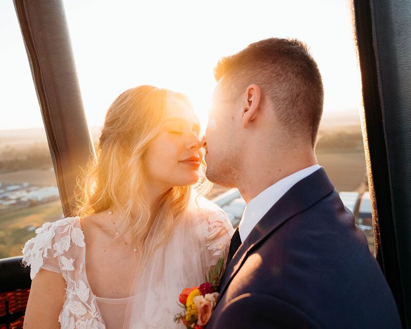 Couple enjoying a hot air ballon ride in the PNW during their elopement