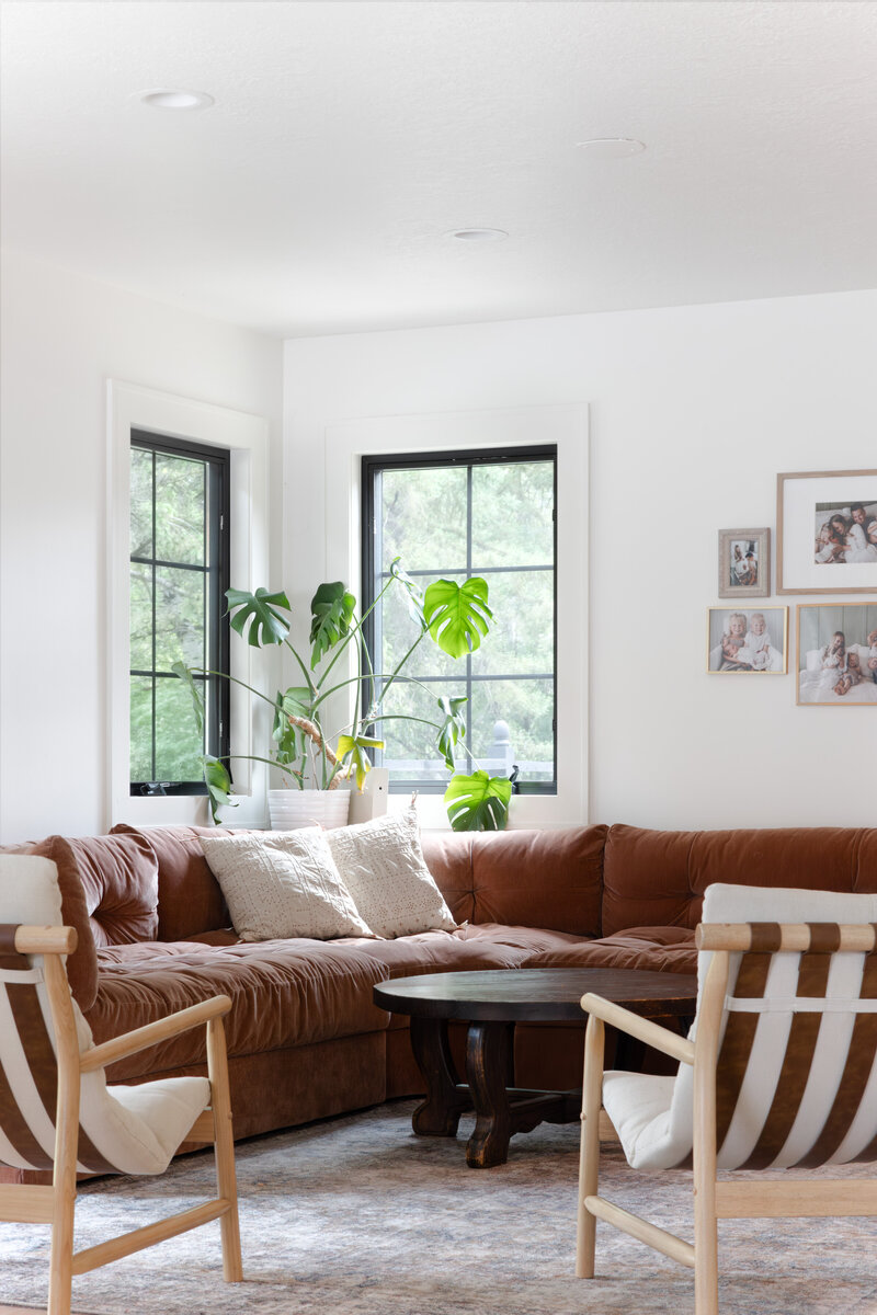cozy mid century mod living room with leather couch