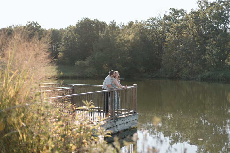 An engaged couple having fun at Powell Gardens during their engagement photoshoot.