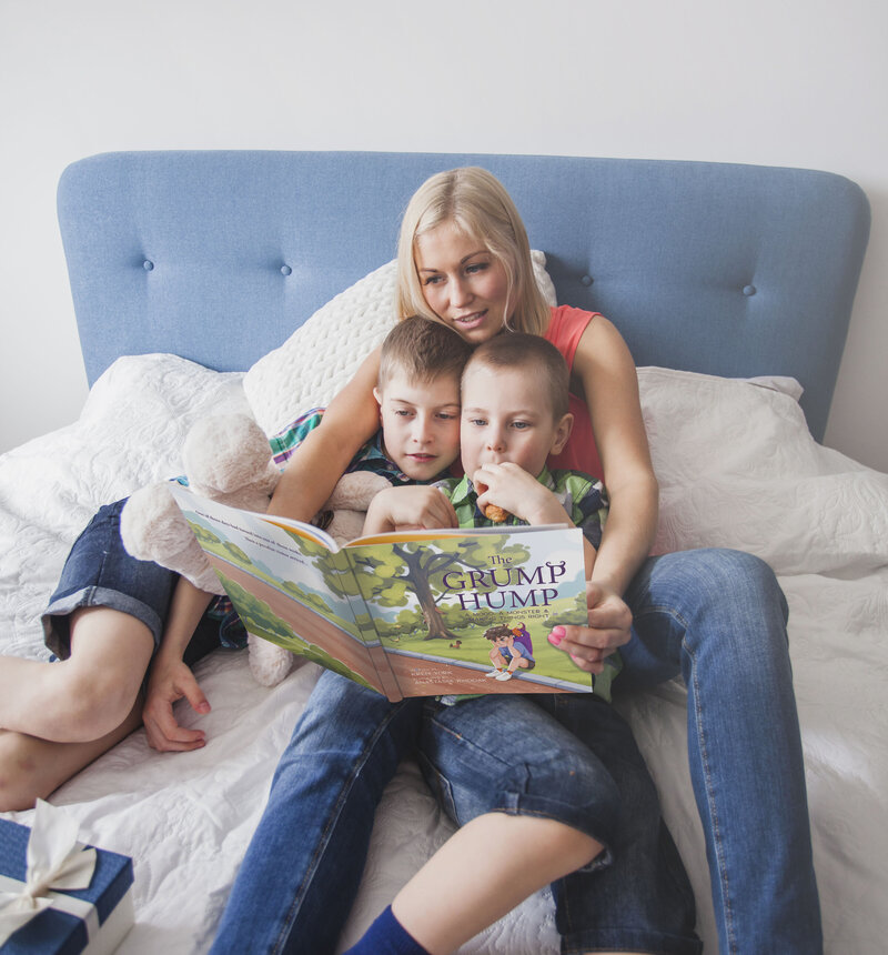 mom-reading-to-two-boys