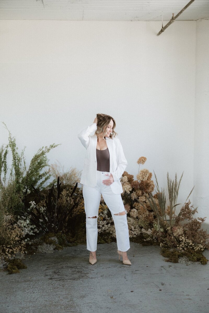 Confident midlife woman embracing natural healing—Vanessa supports perimenopausal and menopausal women with integrative wellness coaching