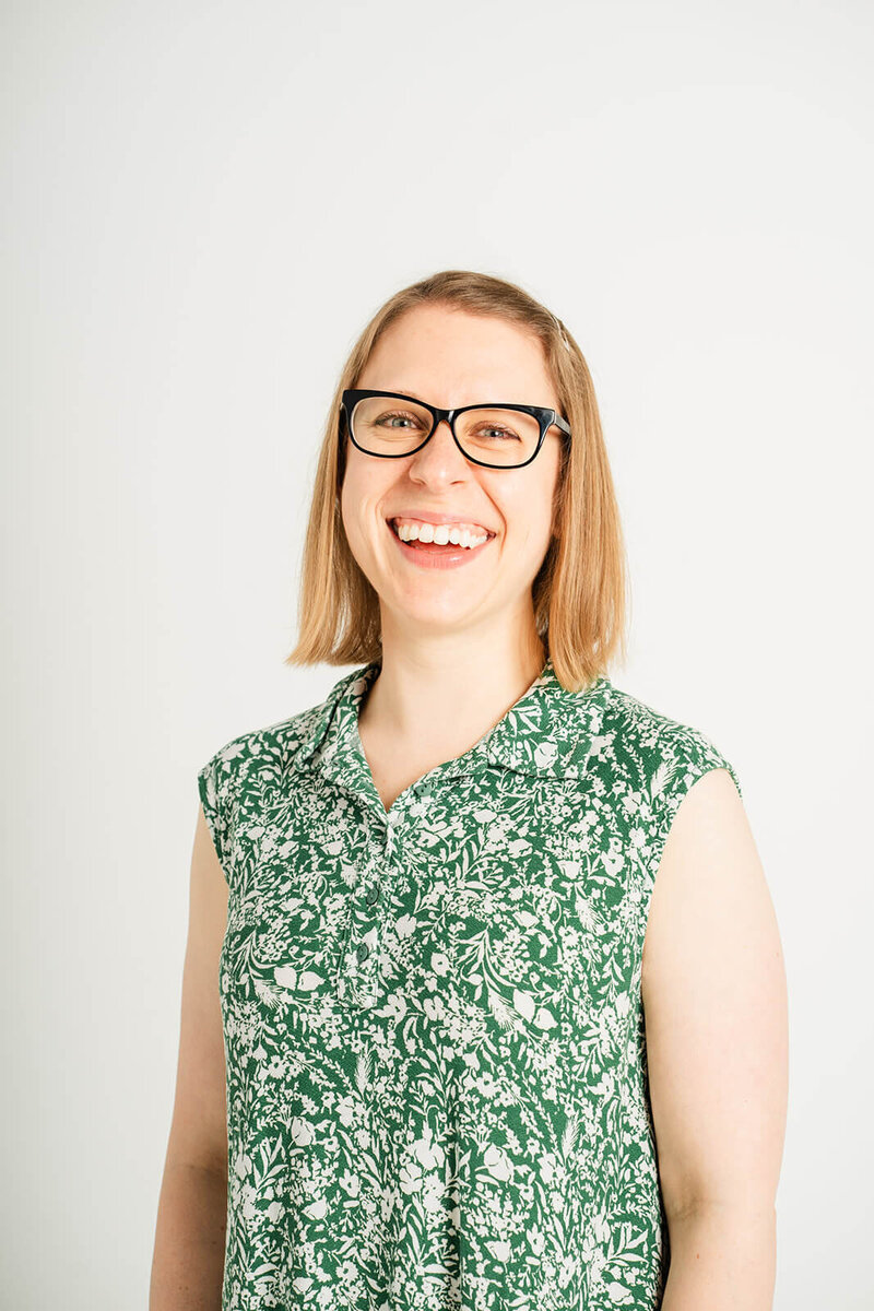 Stephanie Pampel, American accent coach for professionals and performers, laughs while looking toward the camera.